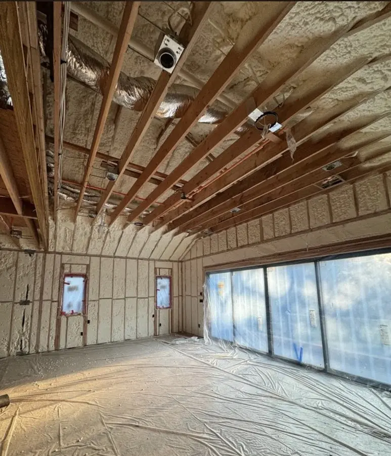 Interior walls and ceiling insulated with spray foam during new construction in Bethany